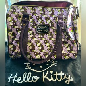 Hello kitty handbag like new with dust bag.